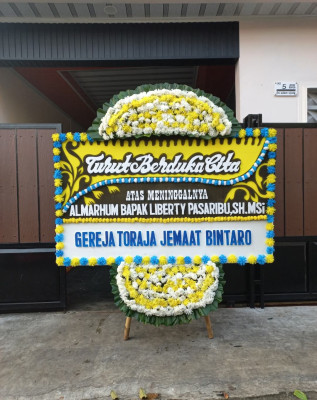 Papan Bunga Duka di Malalayang Satu Timur